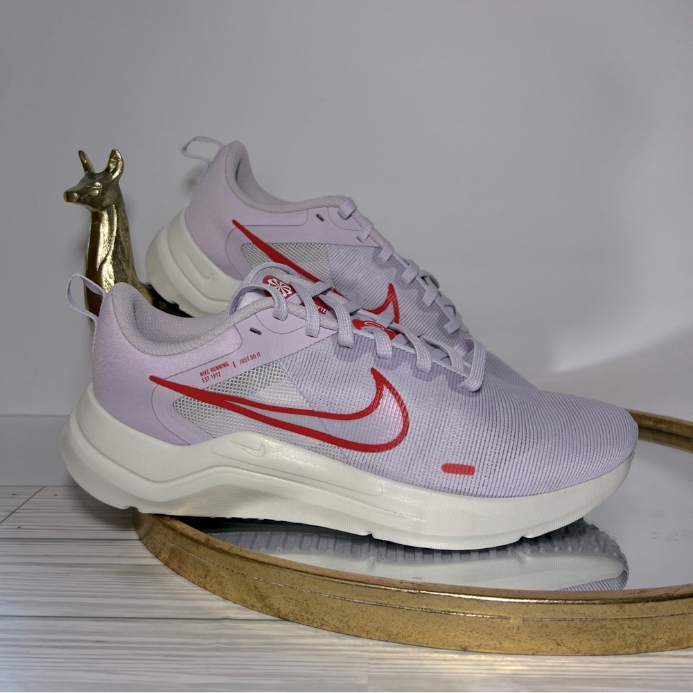 Nike women’s downshifter 12 Low-top running shoes size 9 light purple